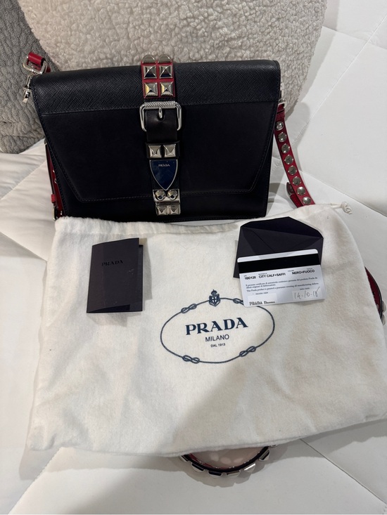 Prada Handbags - Prada Black Leather Shoulder Bag with Red Studded Strap